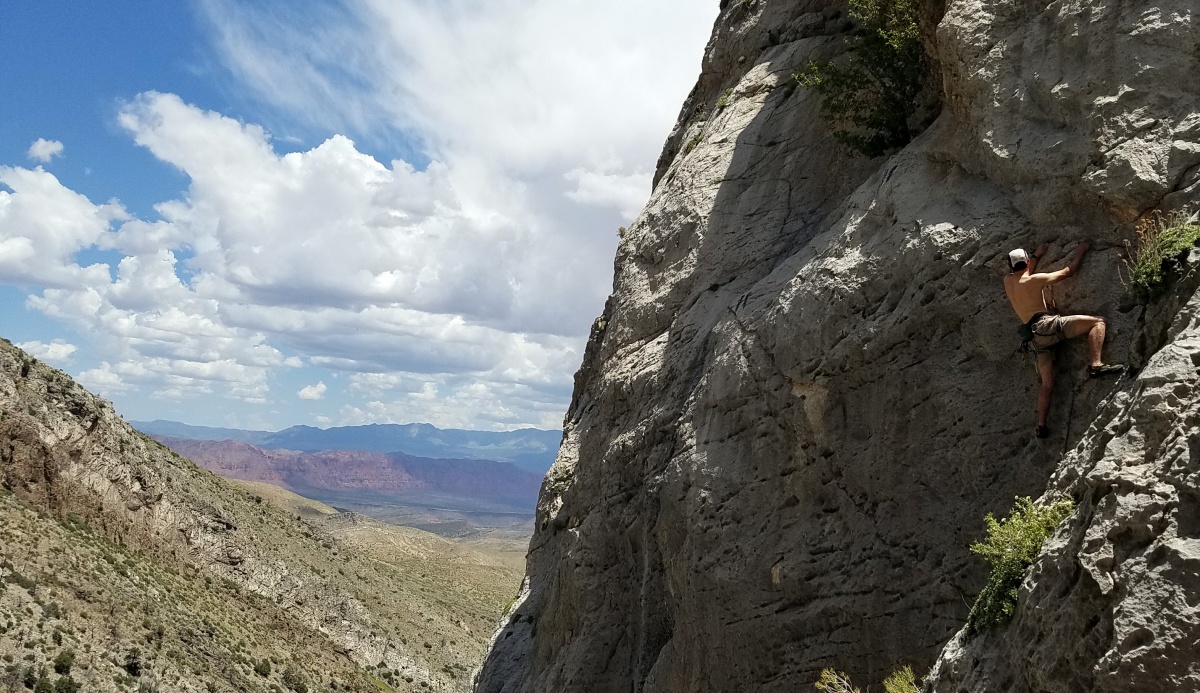 A man climbs a rock wall in Joe's Valley. 