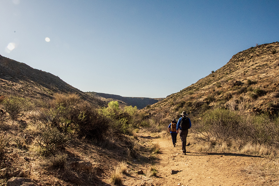 People hike Badger Springs Trail