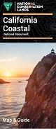 Cover of Coastal Monument Brochure. Towering sea cliff over ocean sunset.
