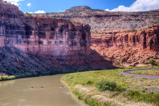 photo of the gunnison river with red rock canyons