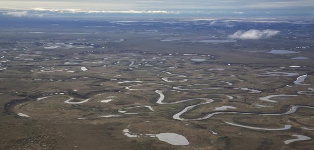 Aerial photo of the tundra and rivers of the Northeast National Petroleum Reserve in Alaska.