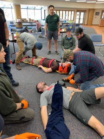 People practicing first aid.