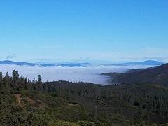 Fog rolls into South Cow Mountain. Photo by Ashley Poggio, BLM.