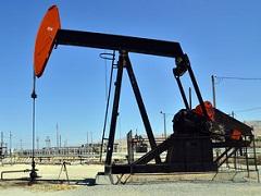 Red and black oIl Derrick in Bakersfield FO. (John Ciccarelli, BLM)