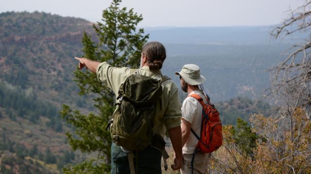 USFS Wilderness & Recreation Manager Brian Murdoch and BLM Archaeologist Jared Lundell overlook the region just south of the Bears Ears Buttes. 