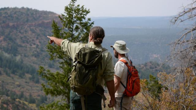 USFS Wilderness & Recreation Manager Brian Murdoch and BLM Archaeologist Jared Lundell overlook the region just south of the Bears Ears Buttes. 
