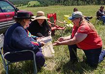 Nakoda Elder Minerva Allen and MT/DKs BLM Botanist Wendy Velman sharing and exchanging plant knowledge.