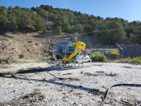 The pilot can control each nozzle on the boom independently, the downward force of the rotor wash reduces off target application of herbicide.  