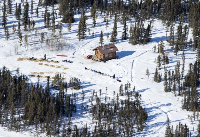 Aerial photo of cabin in woods