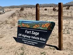 BLM sign being erected at Fort Sage Off-Highway Vehicle area.