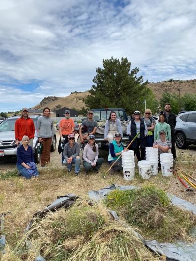 Volunteers with three cubic yards of invasive weeds removed during BLM’s event for SER2021’s Make a Difference Week. (Photo courtesy of Idaho Botanical Garden, with permission).
