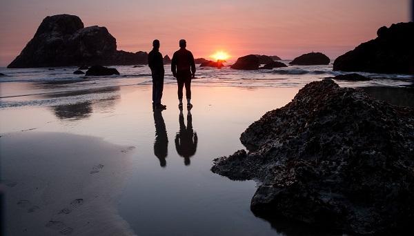 Bob and his husband Noah in a selfie at the CA Coastal National Monument in Trinidad, CA. Bob says: "This spot was 10 minutes from our house and it is a unique example of BLM retaining "leftover lands" that are highly significant -- not just scenic but refugia for seabirds and marine mammals." (Photo by Bob Wick)