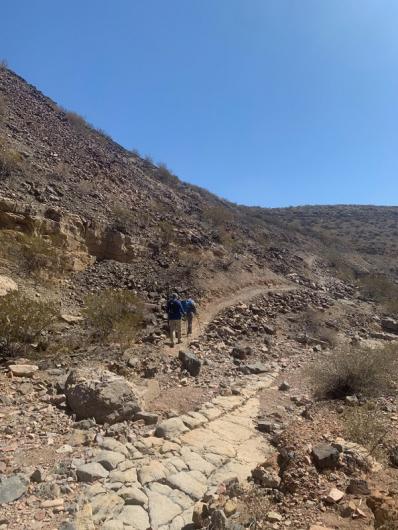 Hikers on the Discovery Arroyo Trail.