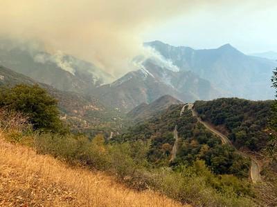 A mountain covered in smoke.