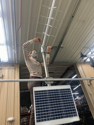 Man assembling an antenna