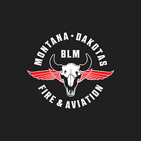 Montana Dakotas Fire and Aviation Logo. Buffalo Skull with red wings behind it. Montana Dakotas BLM Fire and Aviation.