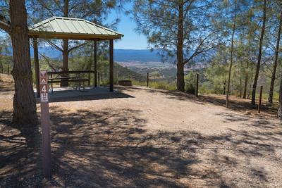 Camp site with ramada and picnic table. Photo by Jesse Pluim, BLM. 