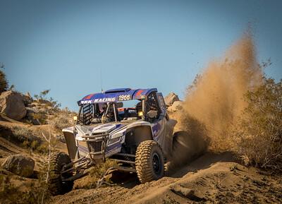 Off road vehicle in the desert.