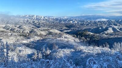 Snow on a low mountain range.