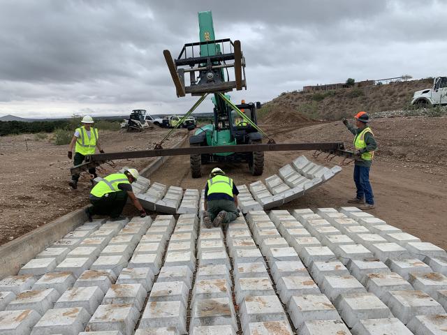 Las Cruces District Force Account crews layout and install articulating mats.
