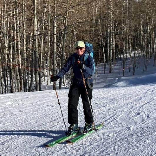 Woman standing on skis in the snow