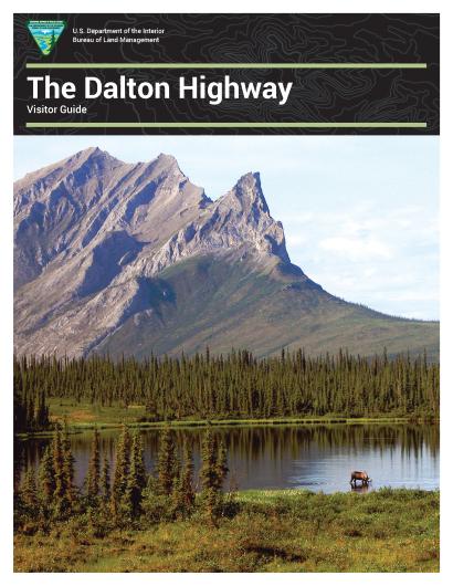 A brochure cover for the Bureau of Land Management in Alaska's Dalton Highway Visitor's Guide. The cover photo is of a moose drinking out of a distant pond with an imposing mountain, Sukapak, in the background.