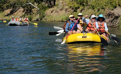 River rafters on a forest river