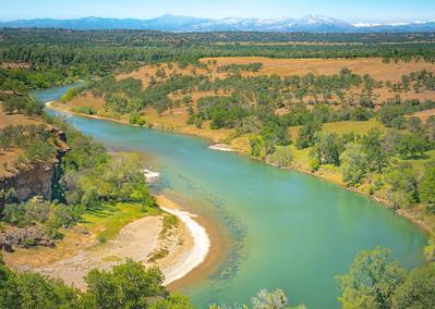 A river winds through a dry valley