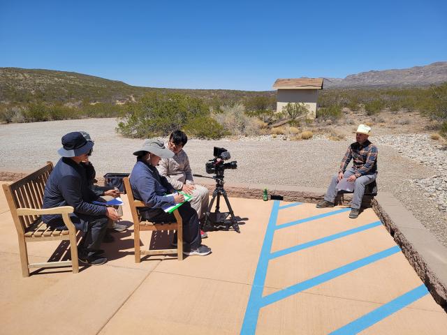 Las Cruces District archaeologist Cody Dalpra is interviewed by Director and Producer Tae Joo Suel  with Munhwa Broadcasting Corporation (MBC) out of South Korea. 