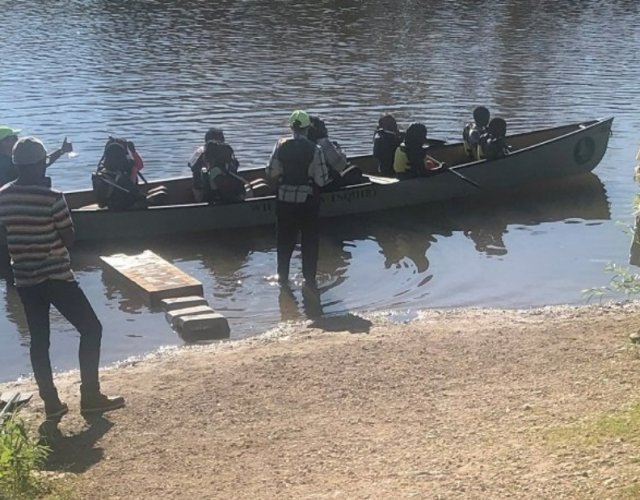 Paddlers on their way out on the water at Lincoln Creek Park in Milwaukee, Wisconsin. (Photo by Martha Malik)