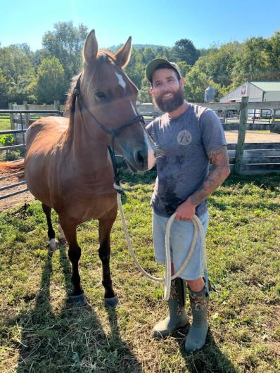 Man and horse.