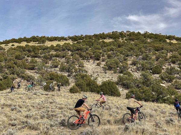 A number of riders heading up the ridge on their rides to reach the new downhill trail.