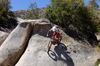 A dirt bike on a rock