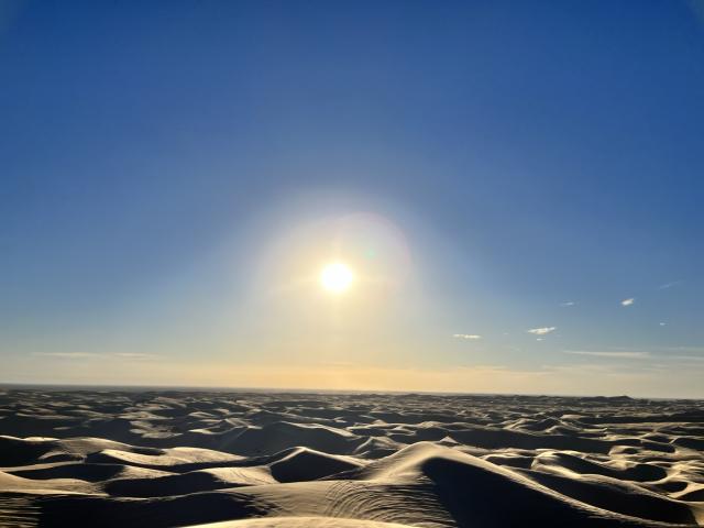 Sunset over a dune field