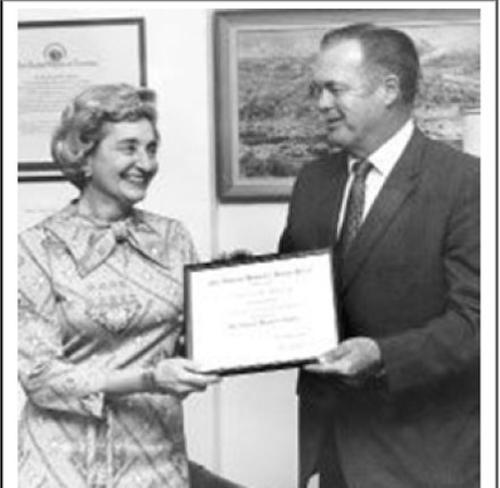 Eleanor Schwartz receives a Federal Women's Award from Boyd Rasmussen, Director of the BLM from 1966 to 1971.