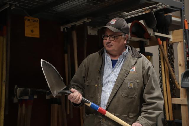 John Markalunas, a firefighter with the Bureau of Land Management, displays one of the most effective firefighting tools at his disposal. (Photo courtesy of the BLM)