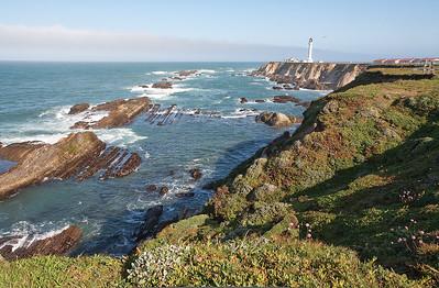 A lighthouse on a cliff