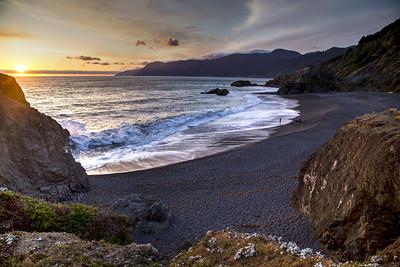 Rocky beach at sunset