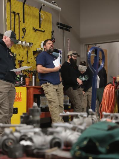 Damon Kurtz, the burn boss for the Deer Haven prescribed fire, briefs his team before setting out. (Photo courtesy of the BLM)