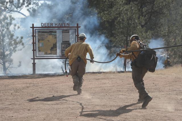 Fire engines, water trucks and water points stand ready for quick access whenever needed to help manage and direct a burn. (Photo courtesy of the BLM)