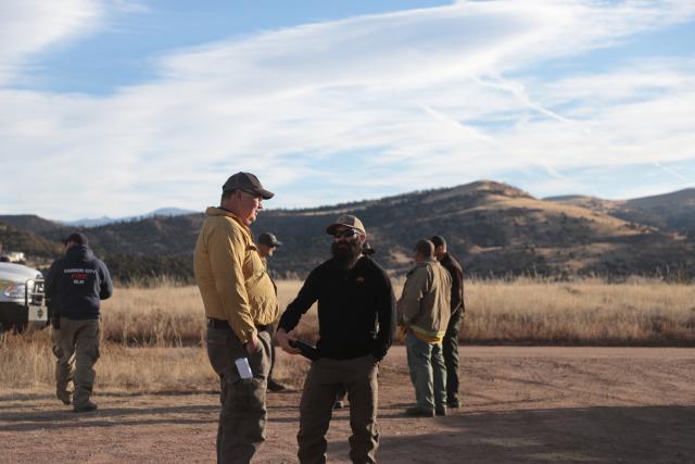 The team revisits the burn plan one last time before preparing for ignition. (Photo courtesy of the BLM)