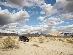 A jeep in a desert in Mojave Trails National Monument.