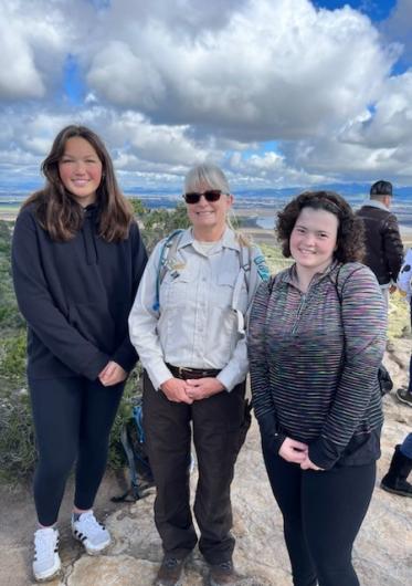 Ranger Tammy is pictured with two high school students, Katlyn Kimball and Lily Lapham, they were students that went through the Junior Ranger Program in the 3rd grade at Toro Park Elementary school. They have returned this year to assist Ranger Tammy with the Saturday hikes. 