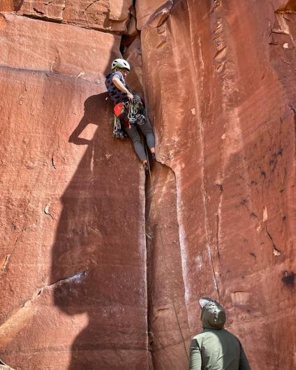 Two climbers scaling a wall within the Indian Creek Area in Bears Ears National Monument. Photo used with permission. Credit: Faith Dickey.