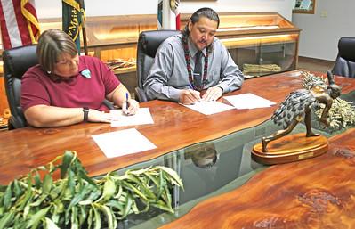 leaders from the Bureau of Land Management and the Mooretown Rancheria of Concow Maidu Indians of California sign a co-stewardship agreement designed to strengthen cooperation between the BLM Redding Field Office and the Rancheria in managing public and Tribal lands and resources within the Tribe’s ancestral homeland.   The agreement between the BLM and Mooretown Rancheria is the first formal co-stewardship agreement made between BLM California and a federally recognized Tribe.