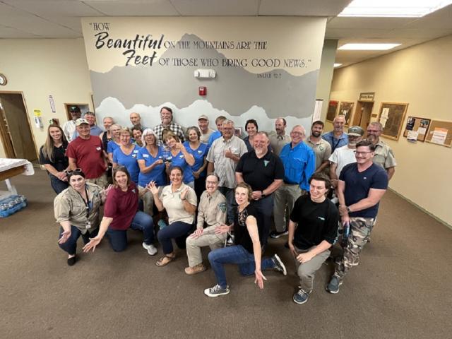 A large group of smiling Prineville District BLM staff pose with the Friends and Neighbors of Deschutes Canyon Area