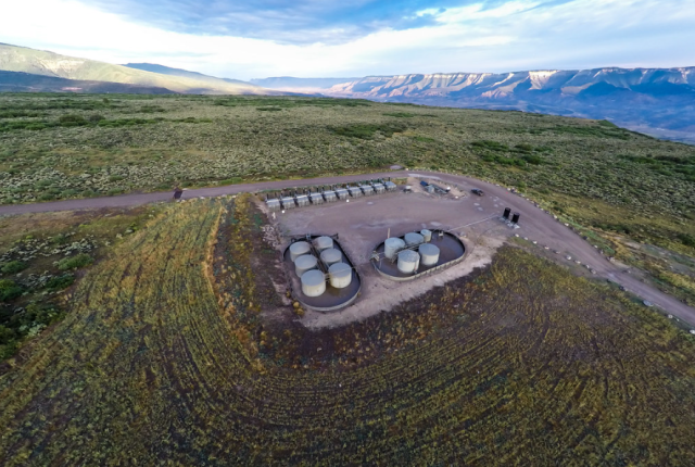 Aerial view of oil and gas infrastructure on landscape