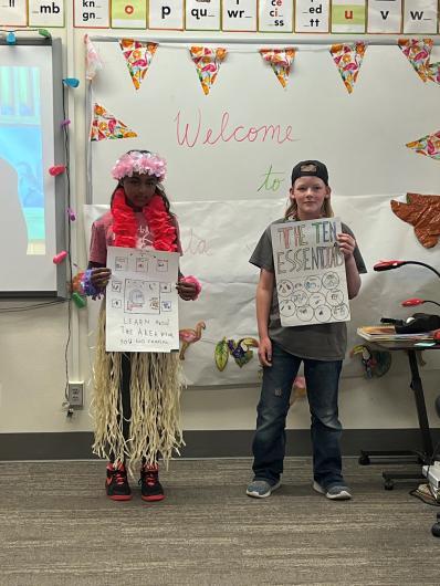 Zoey Baker (left) and Terence Price (right) holding their entries