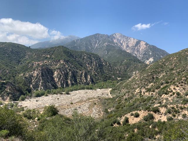 Hills in San Bernardino National Forest under a blue sky.