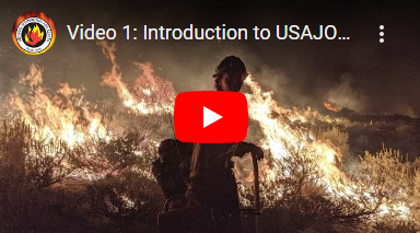 A screenshot of a YouTube video link with wildfire and a firefighter.